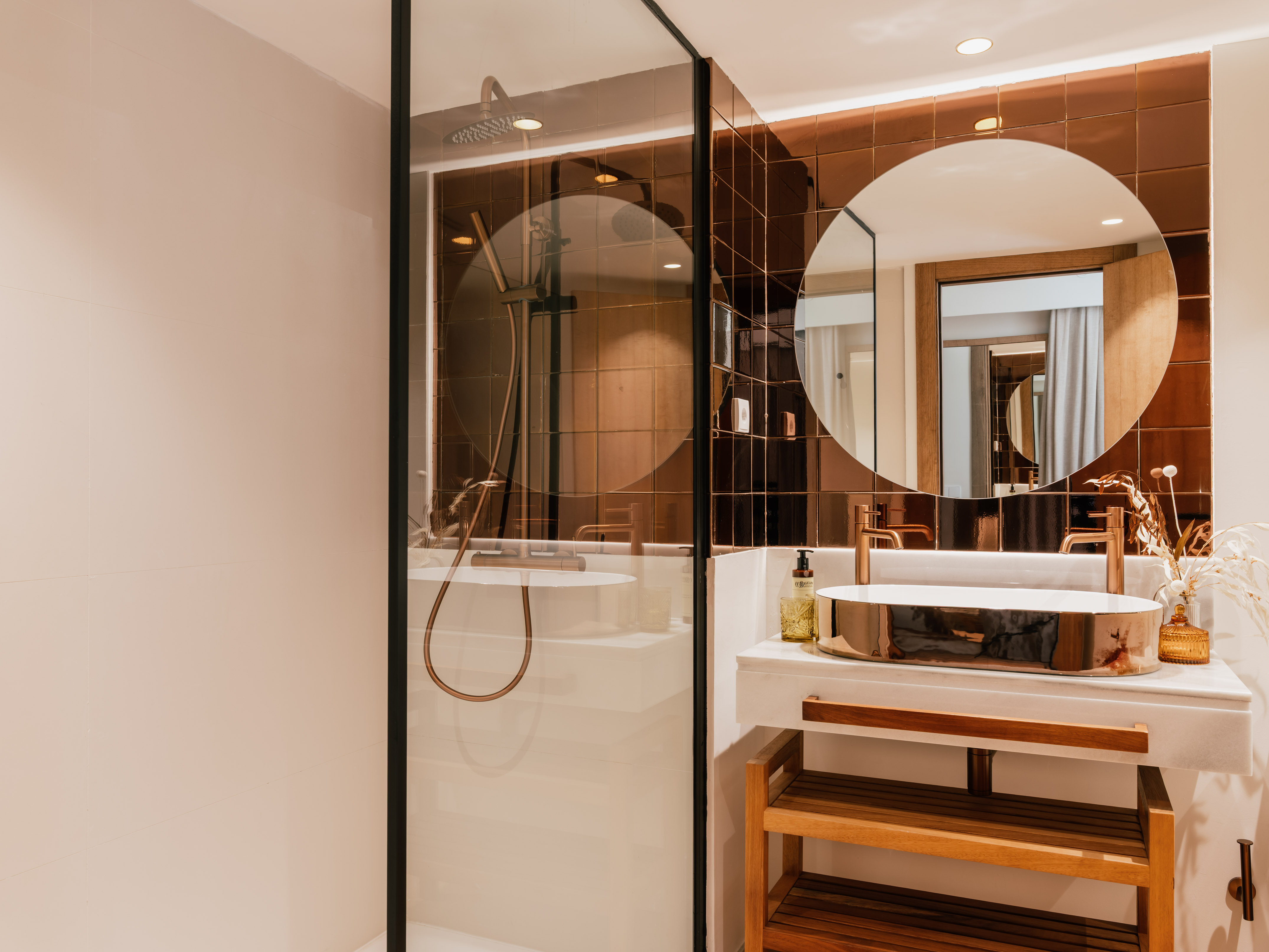 a bathroom with a shower and sink