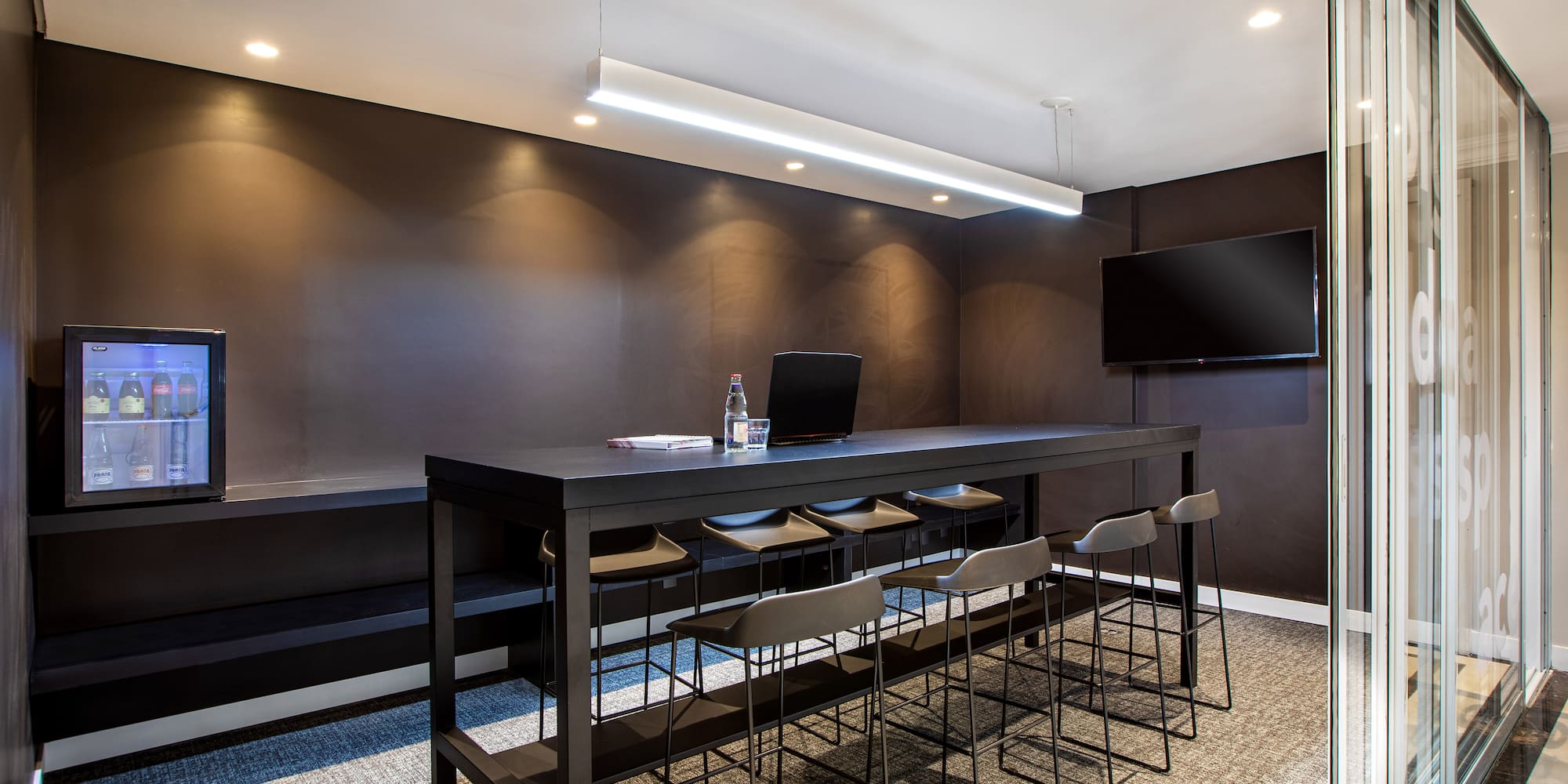 a room with a table and chairs