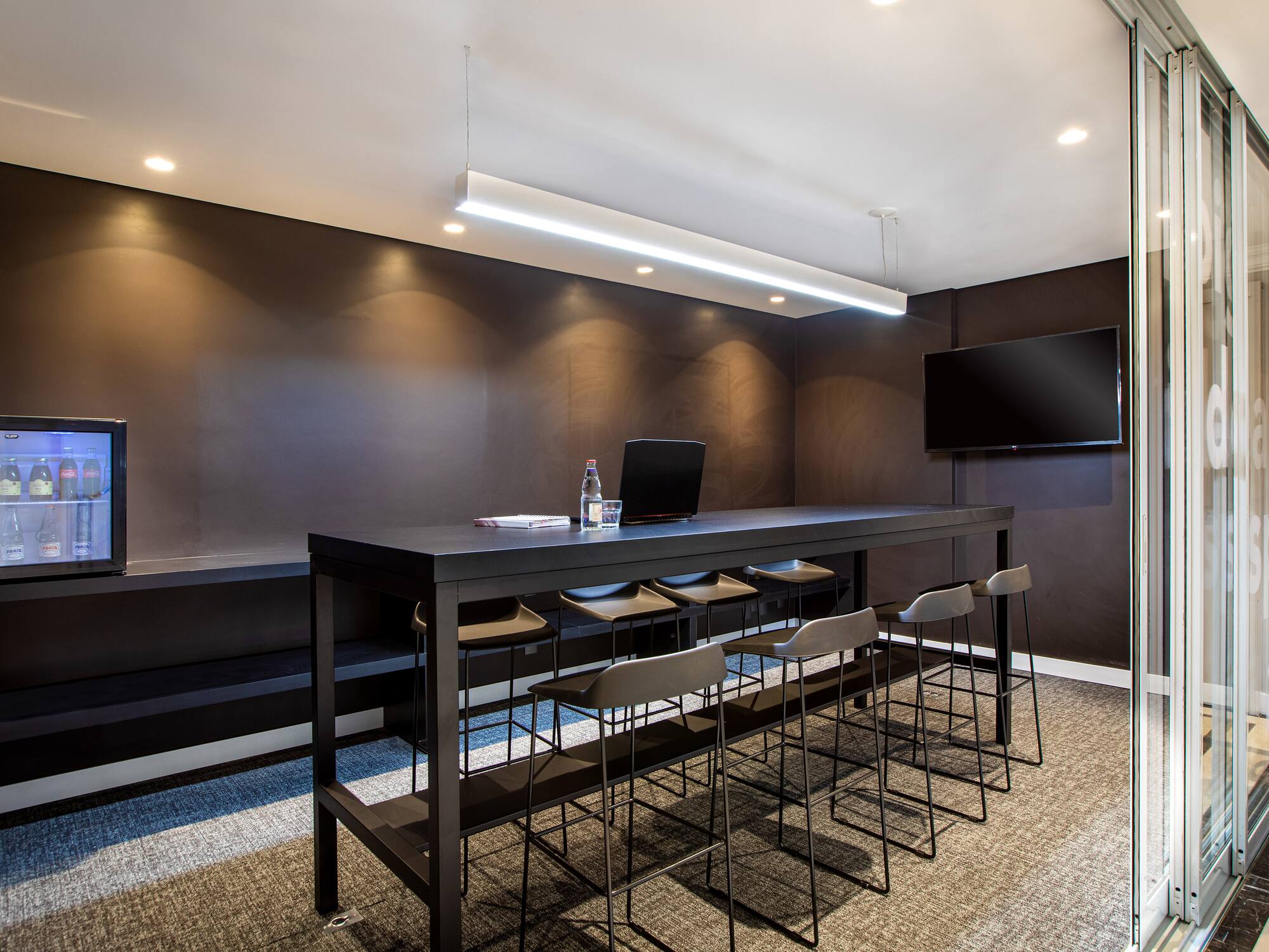 a room with a table and chairs