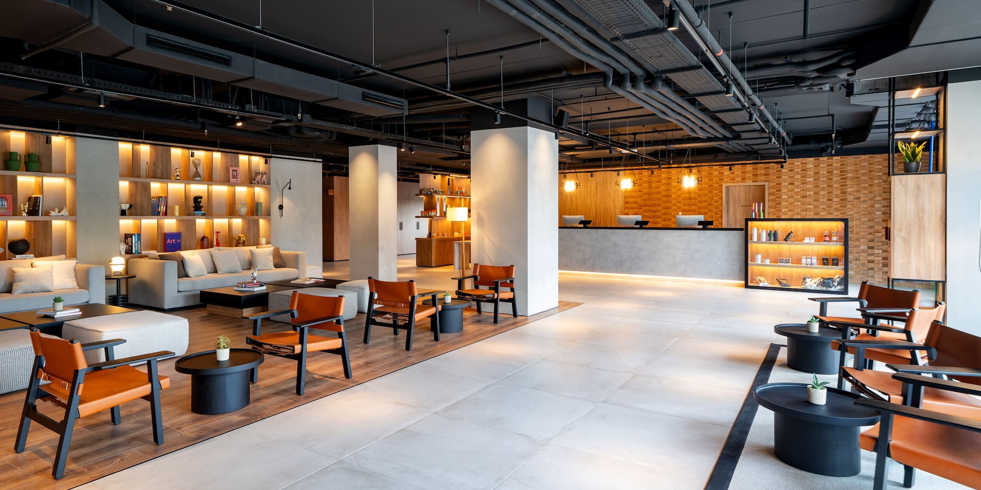 a room with a large reception desk and a couch