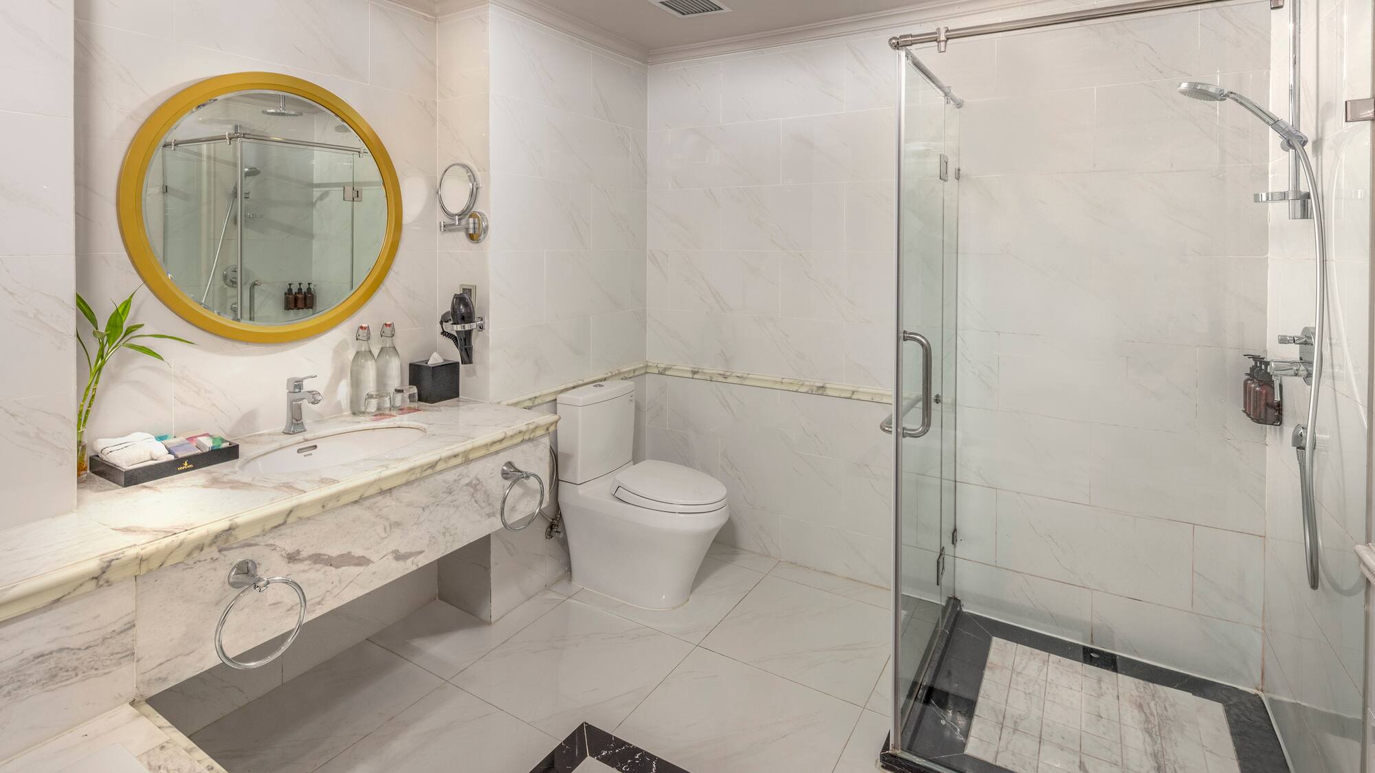 a bathroom with a shower and sink