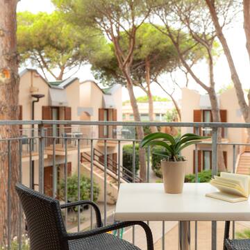 a table with a book and a plant on it