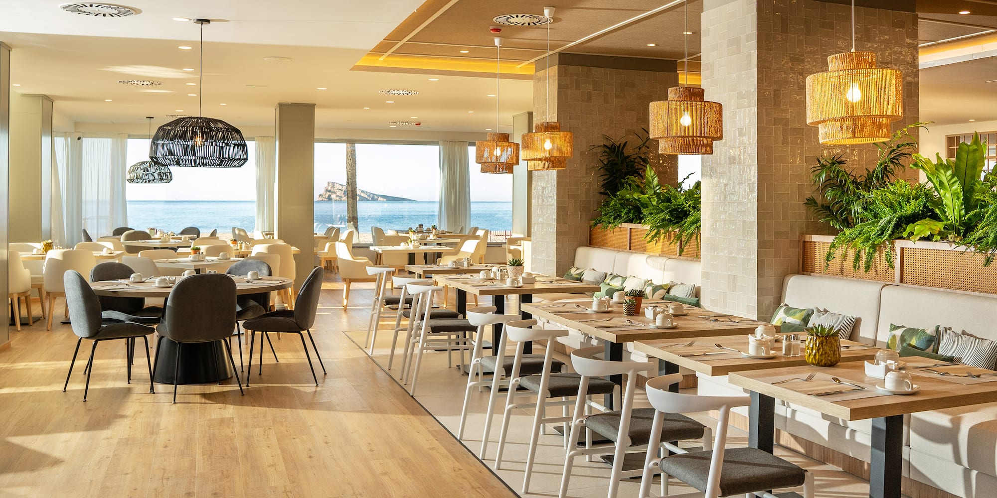 a restaurant with tables and chairs