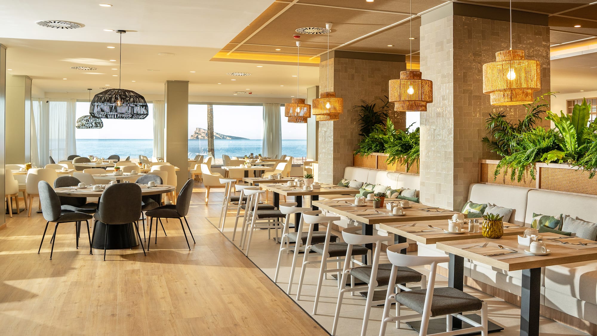 a restaurant with tables and chairs