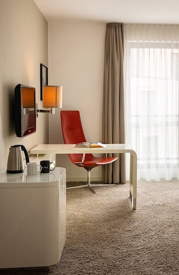 a room with a desk and chair