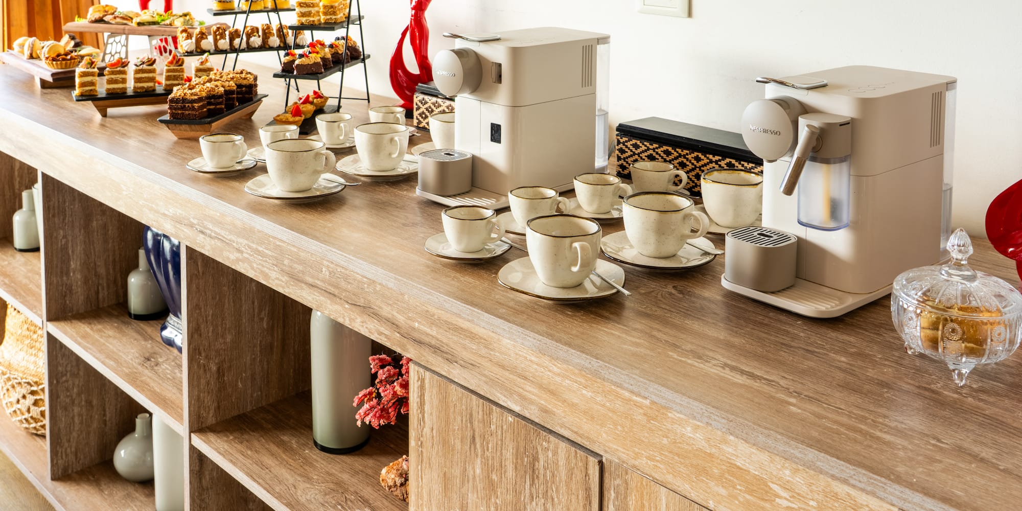 a table with cups and saucers on it