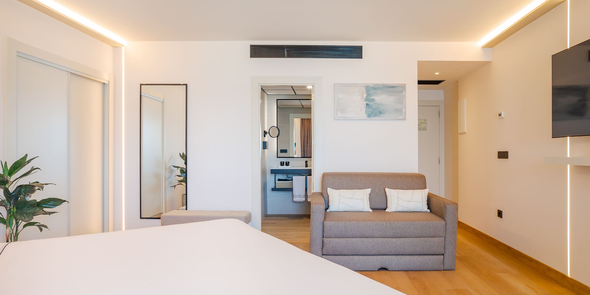 a room with a bed and a couch