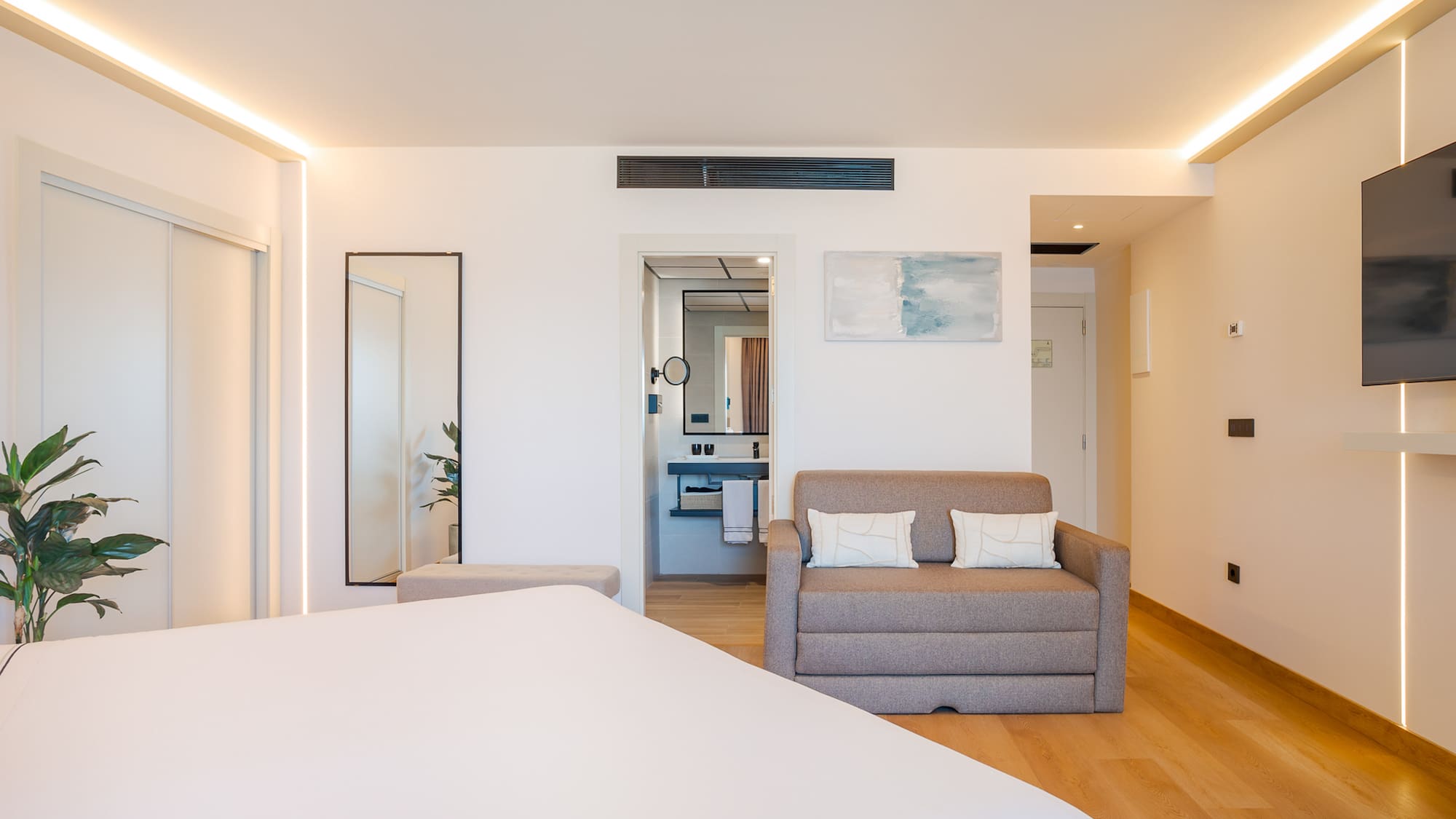 a room with a bed and a couch