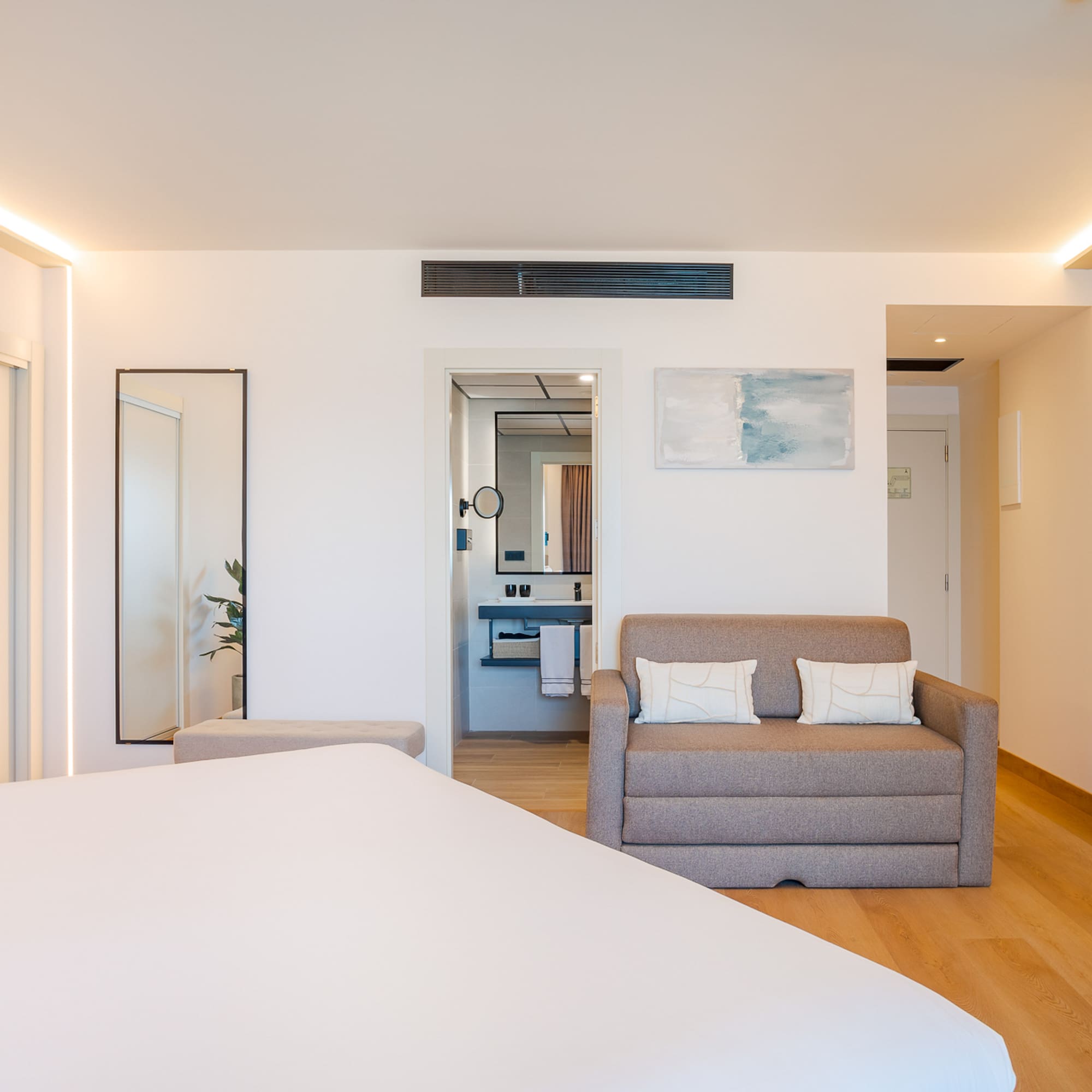 a room with a bed and a couch