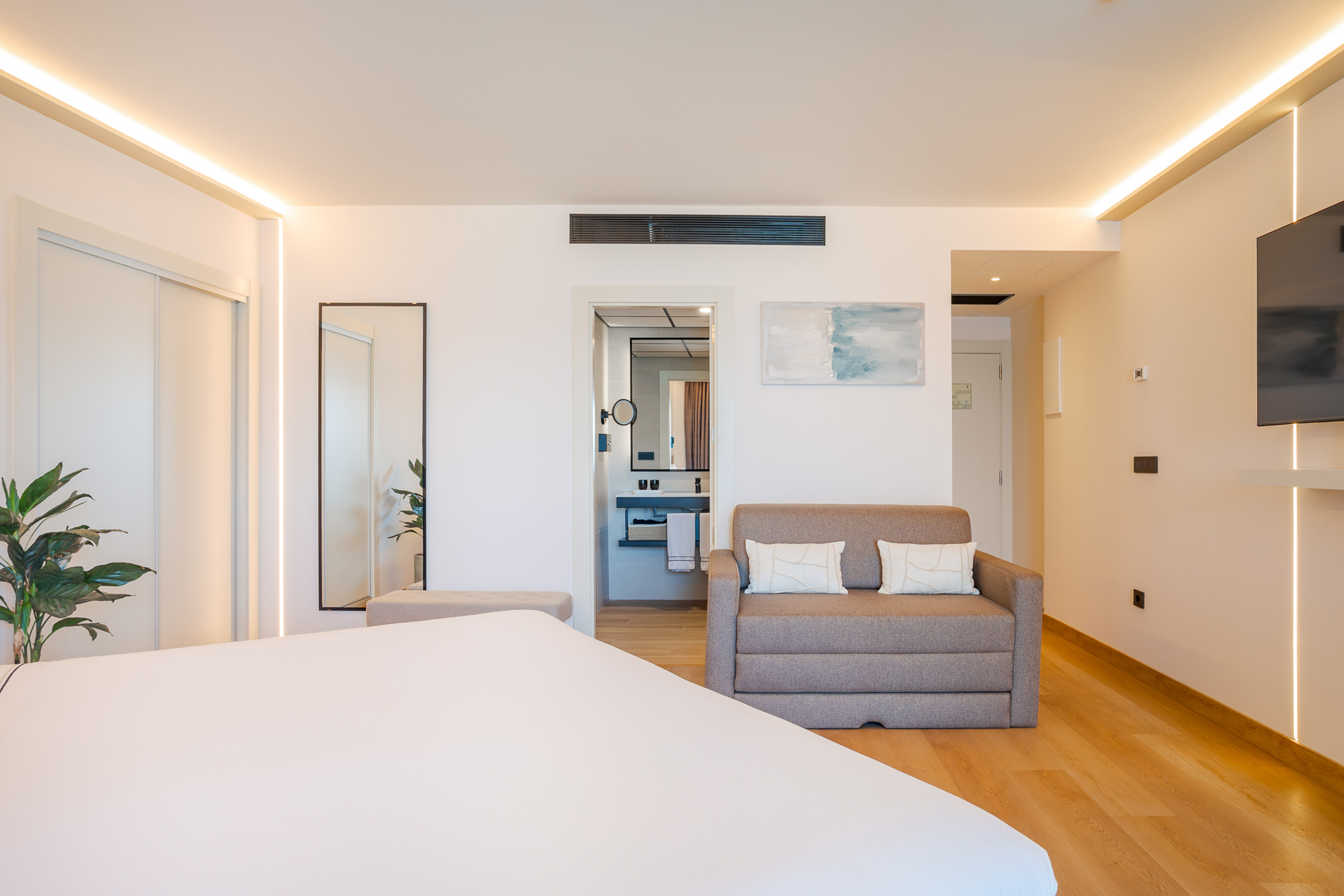 a room with a bed and a couch