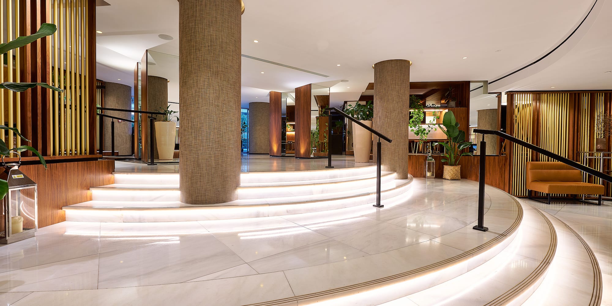 a large circular staircase with white steps