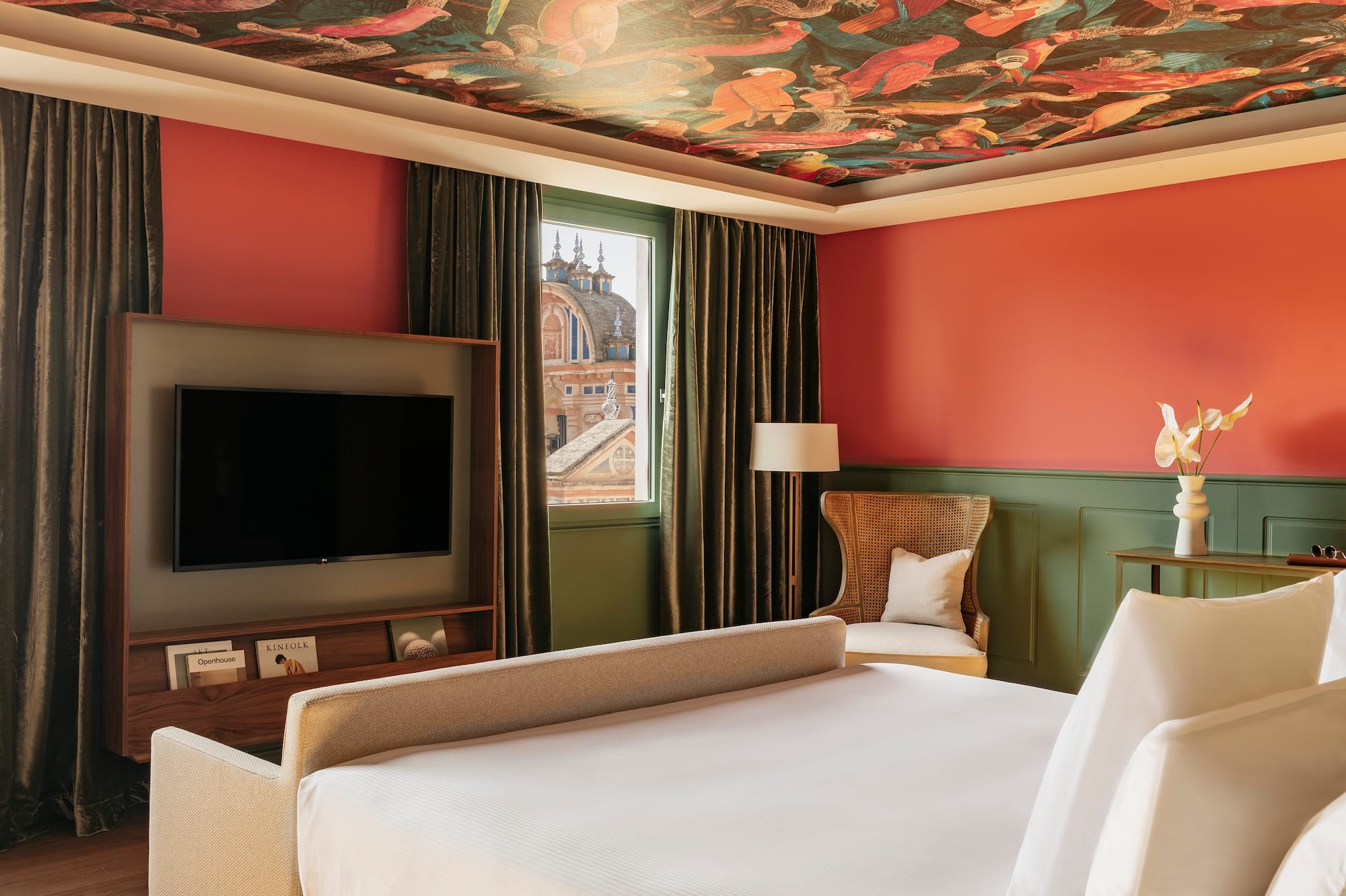 a room with a bed and a tv