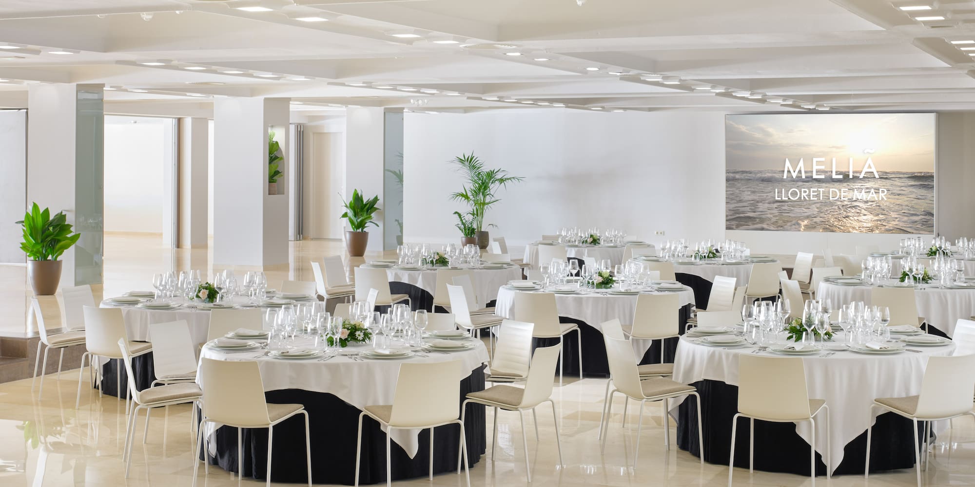 a large room with tables and chairs