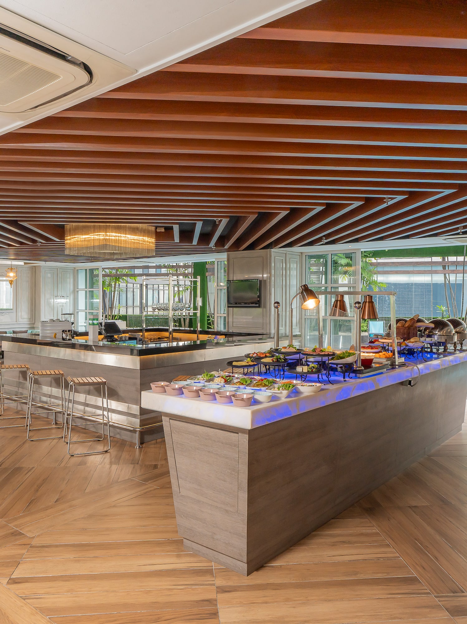 a buffet in a room with a pool