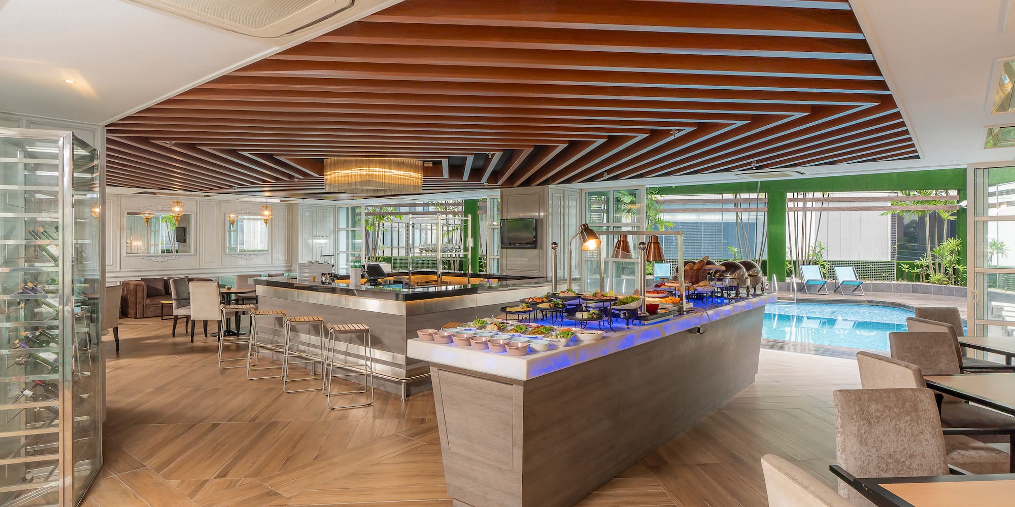 a buffet in a room with a pool
