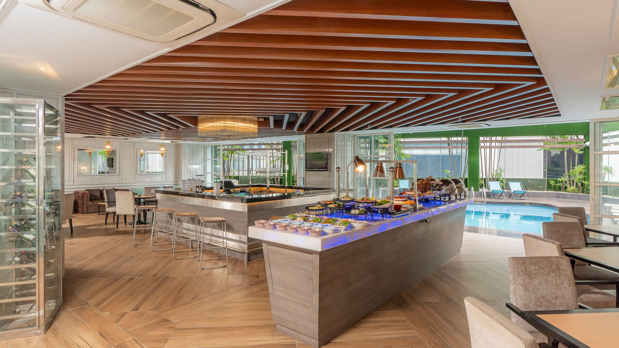 a buffet in a room with a pool