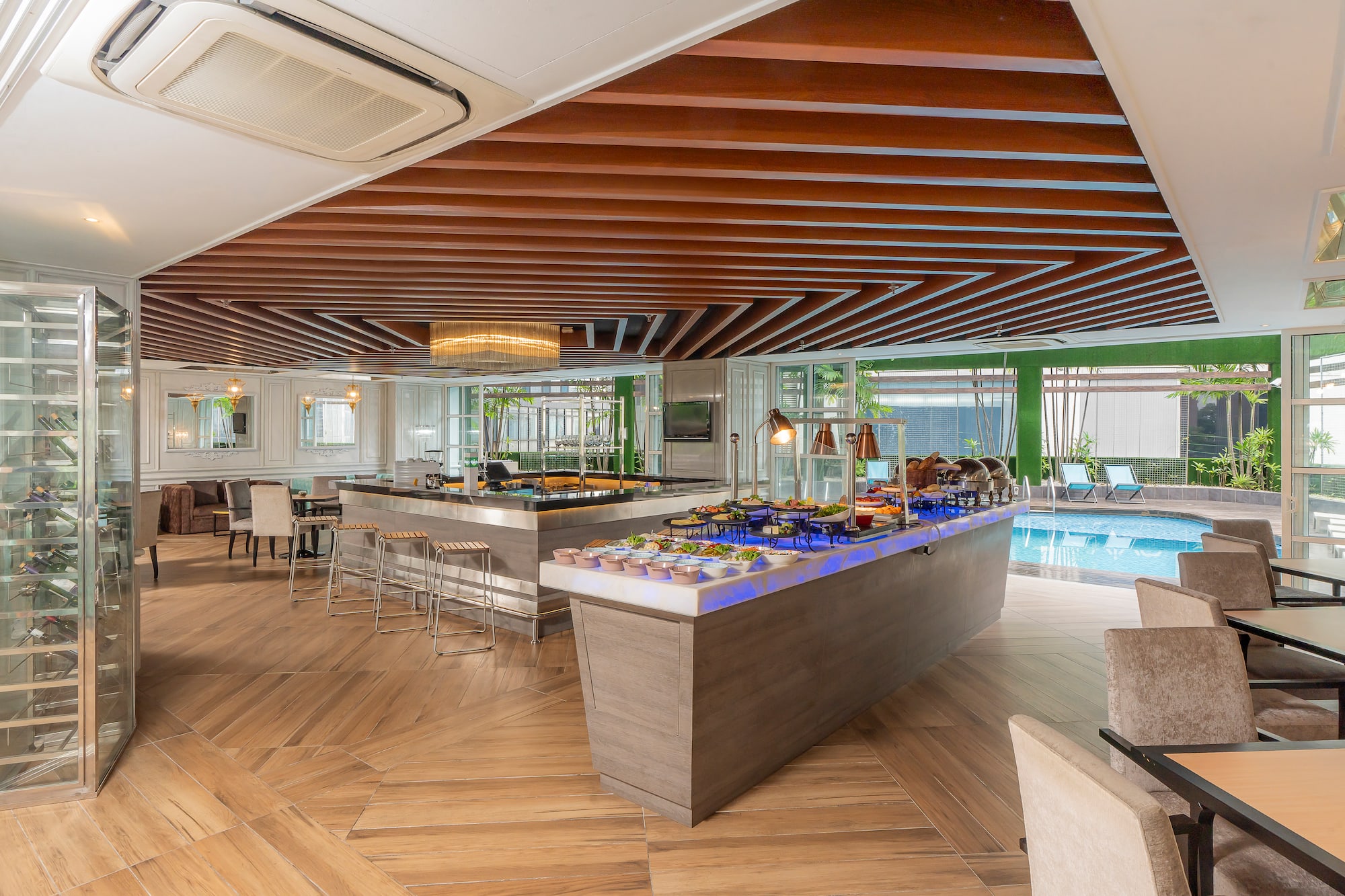 a buffet in a room with a pool