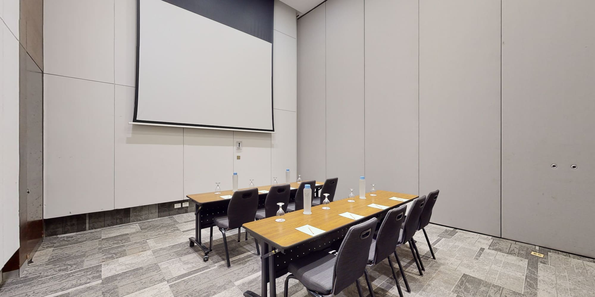 a room with a table and chairs