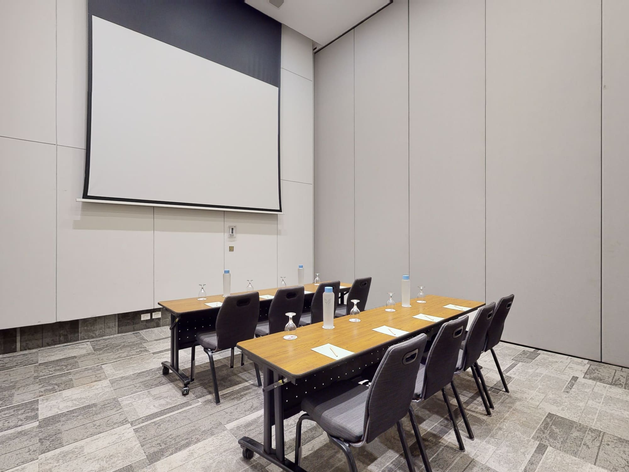a room with a table and chairs