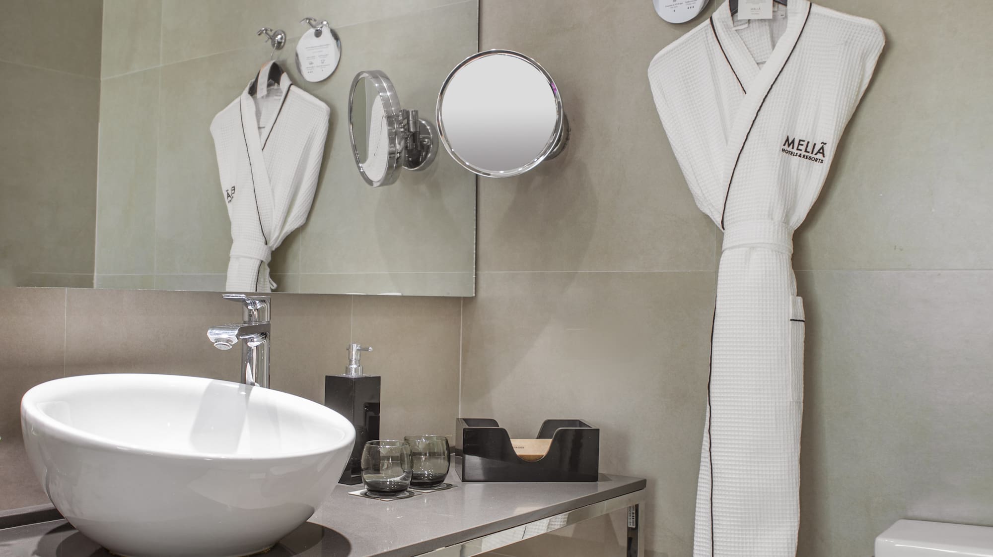 a bathroom with a sink and towels