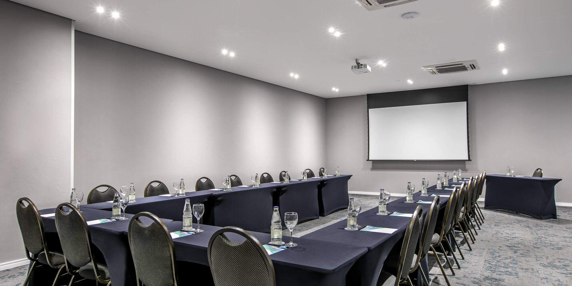 a room with tables and chairs