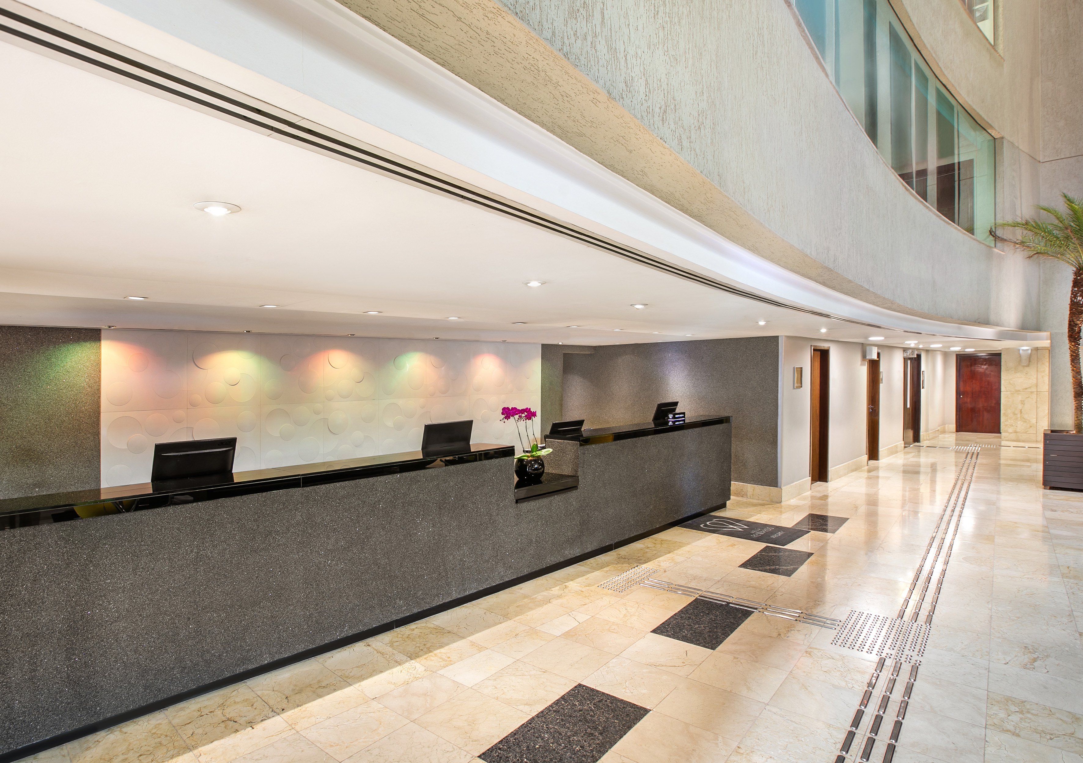 a lobby with a reception desk