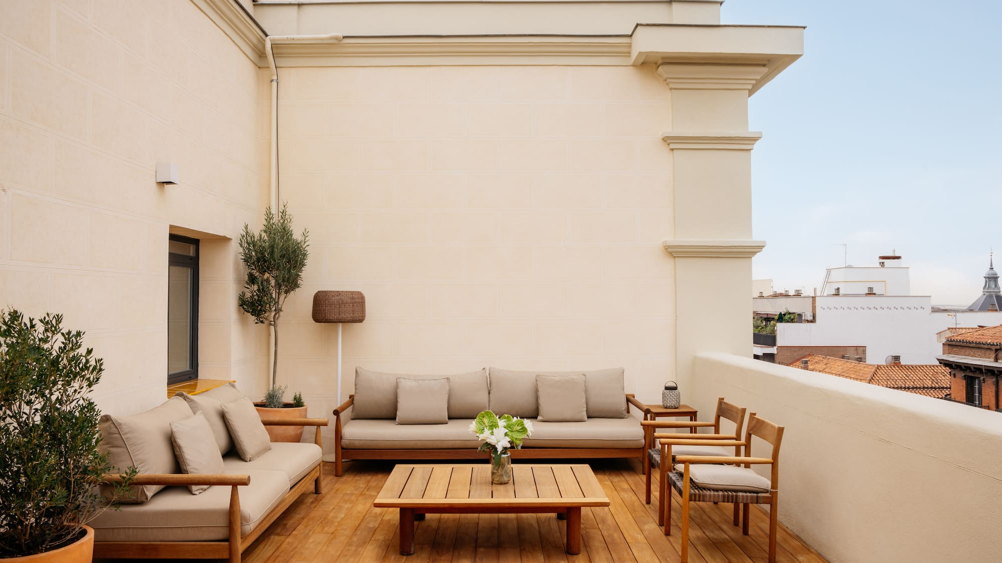 a patio with a table and chairs