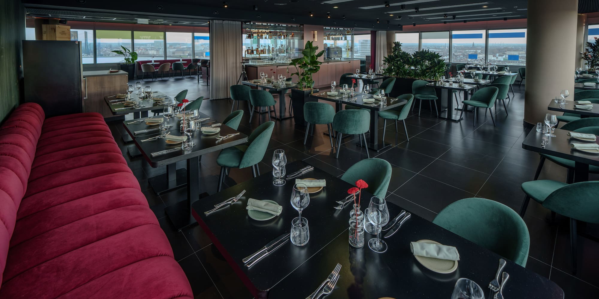 a restaurant with tables and chairs