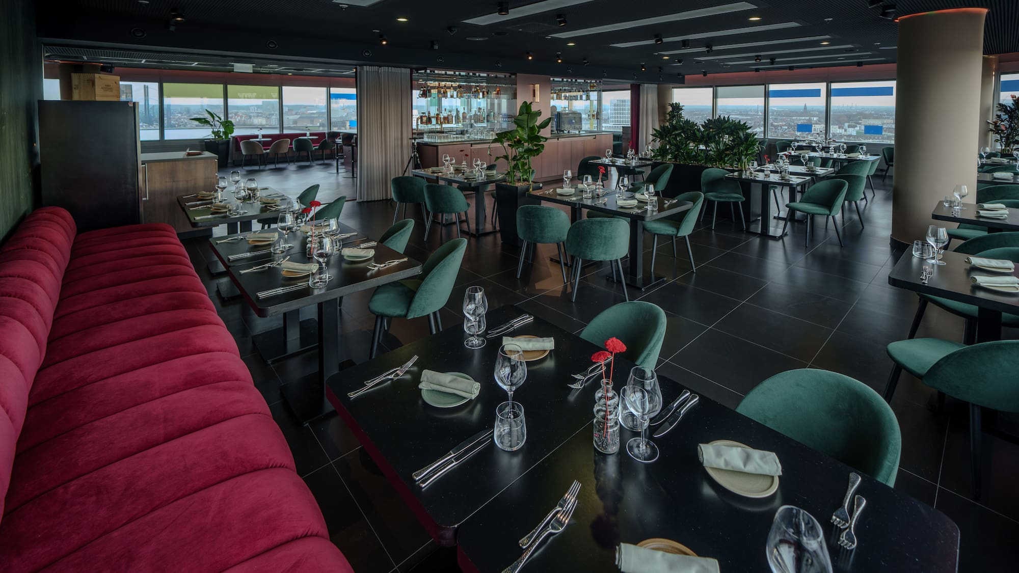 a restaurant with tables and chairs