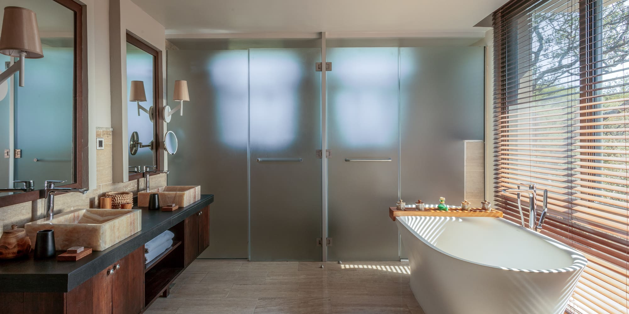 a bathroom with a tub and sink