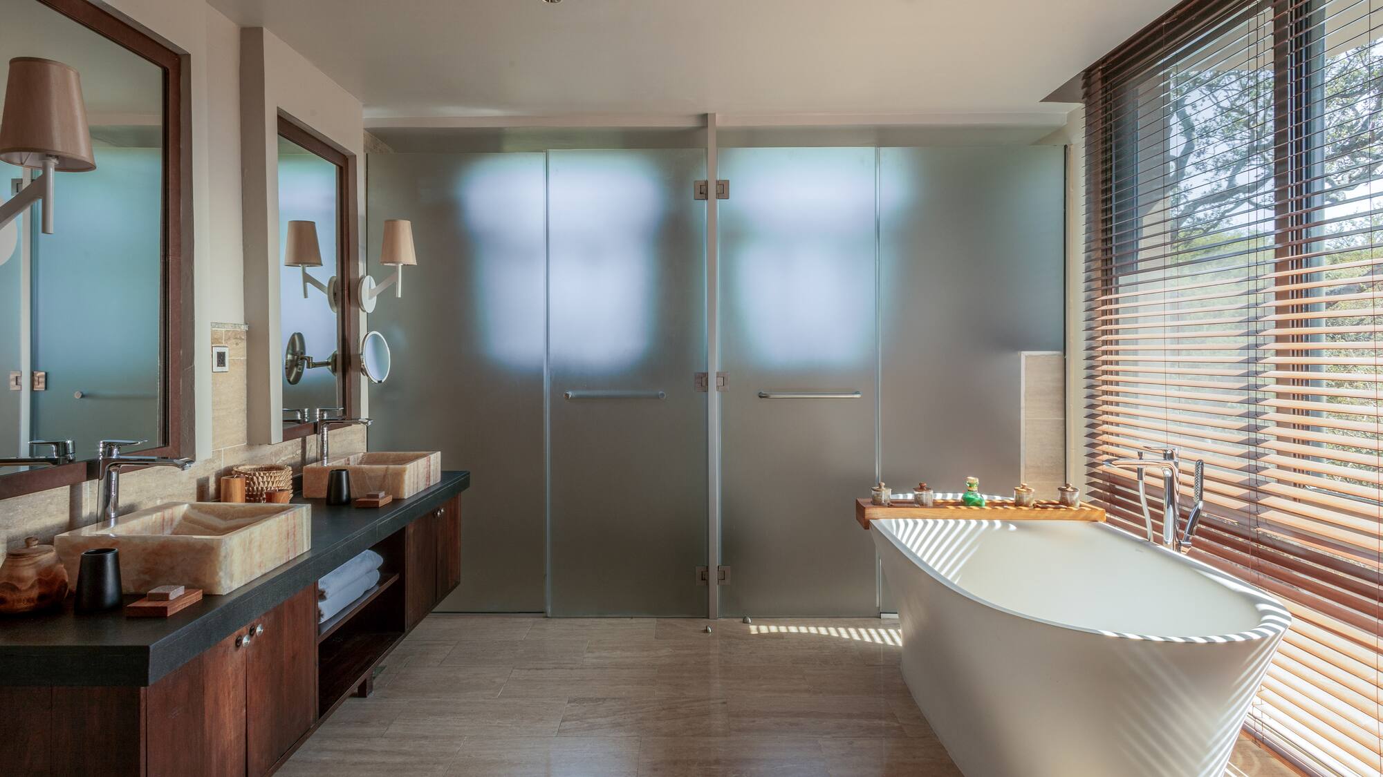 a bathroom with a tub and sink