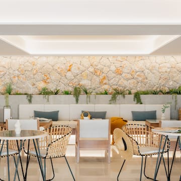 a room with tables and chairs