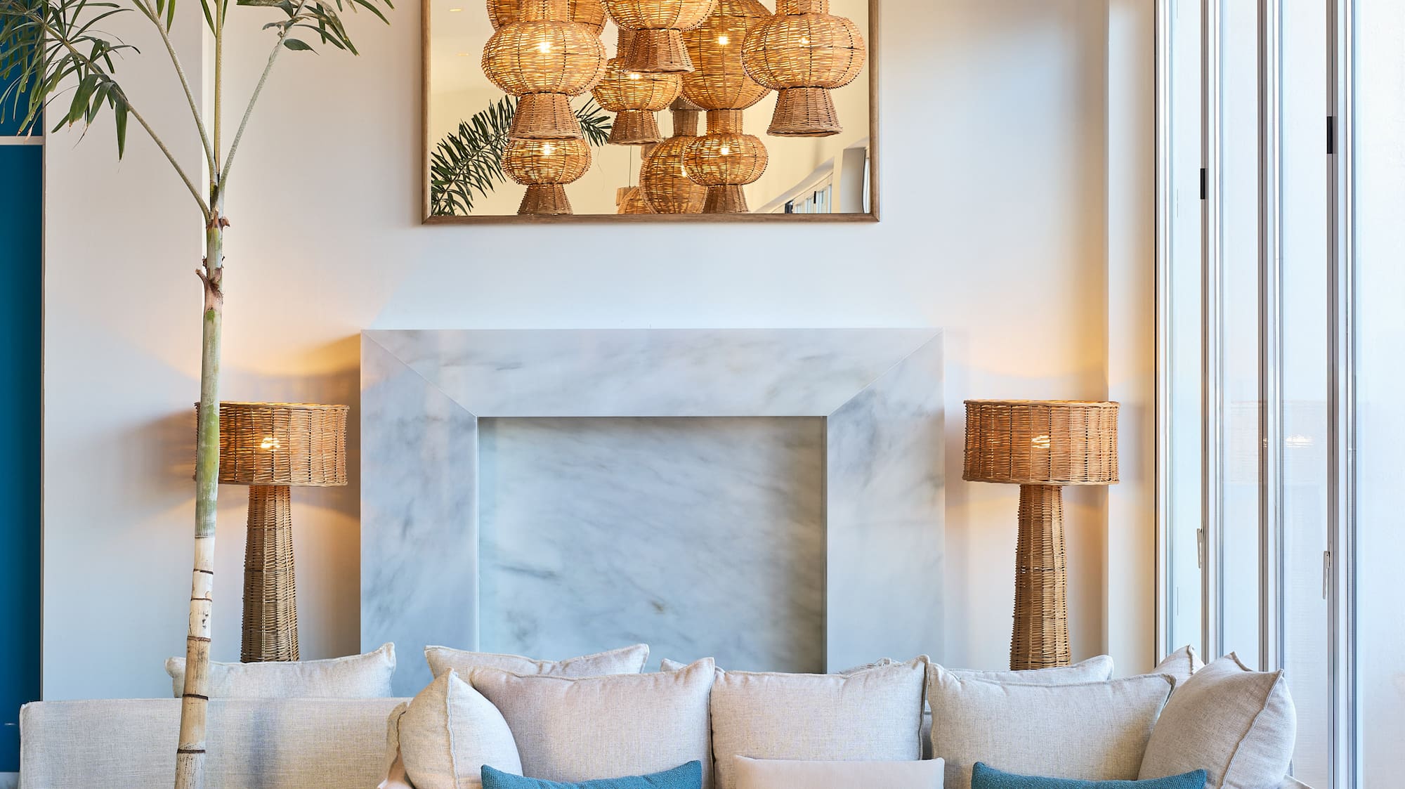 a room with a couch and a fireplace