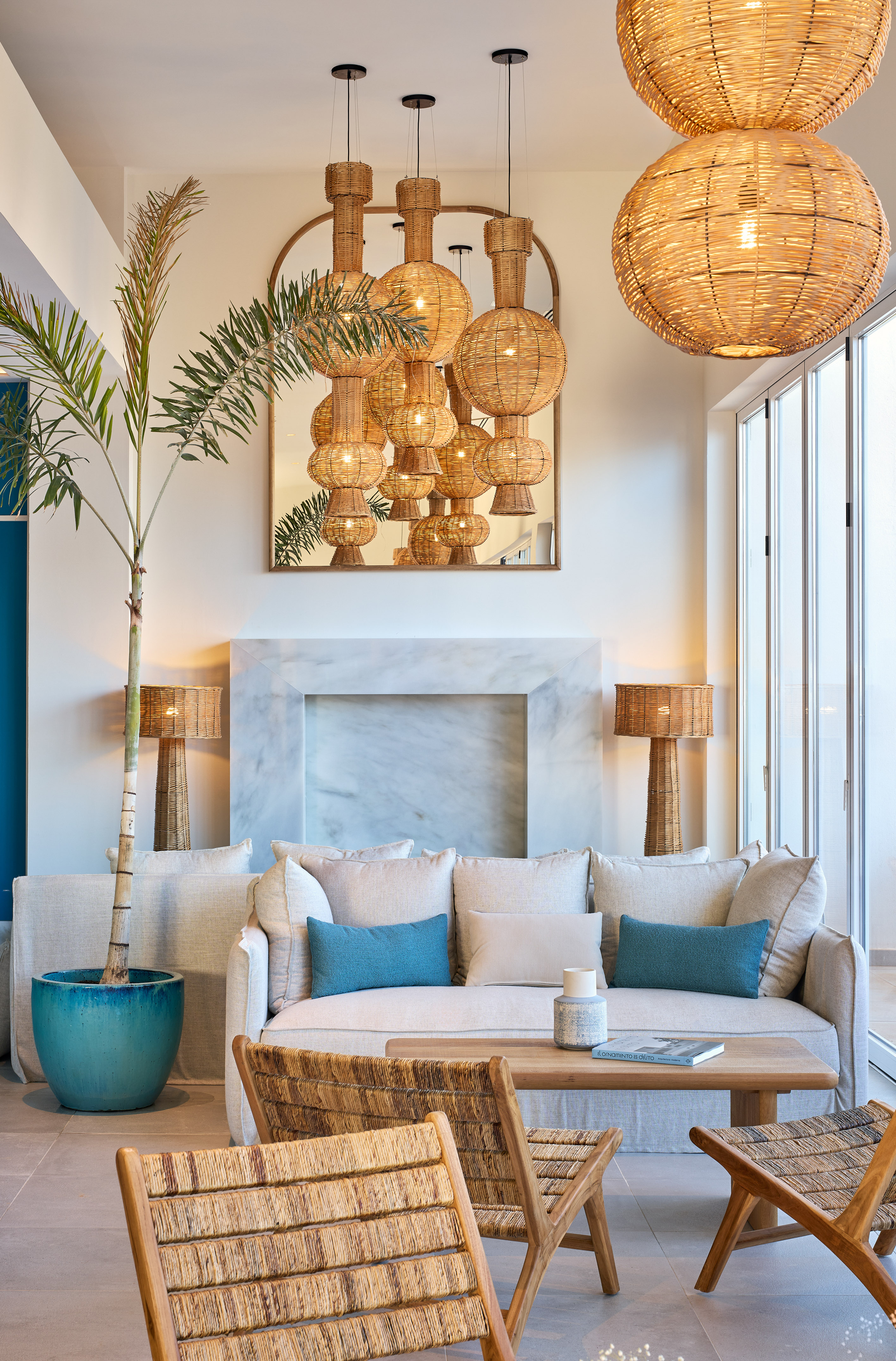 a room with a couch and a fireplace