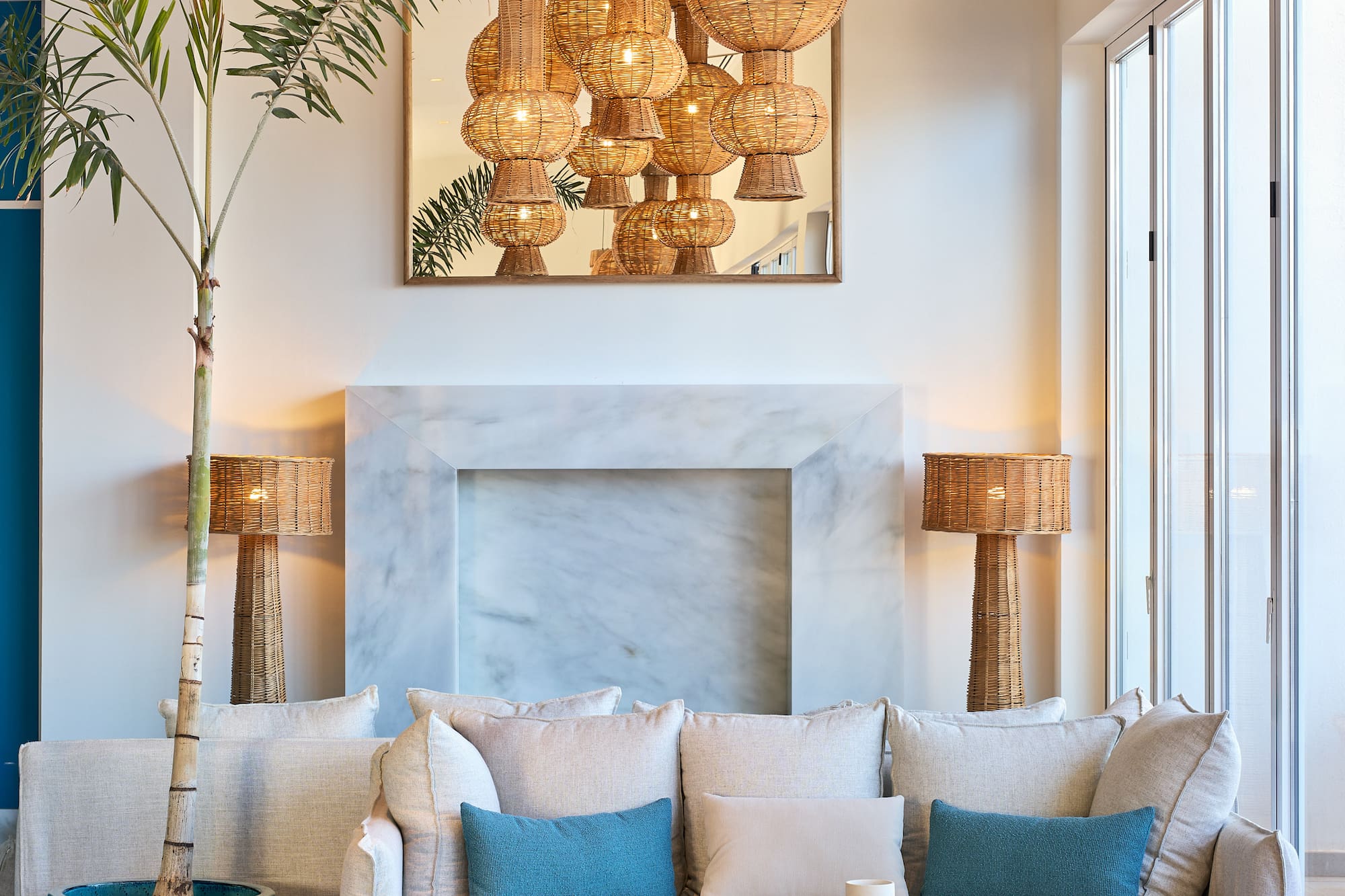 a room with a couch and a fireplace