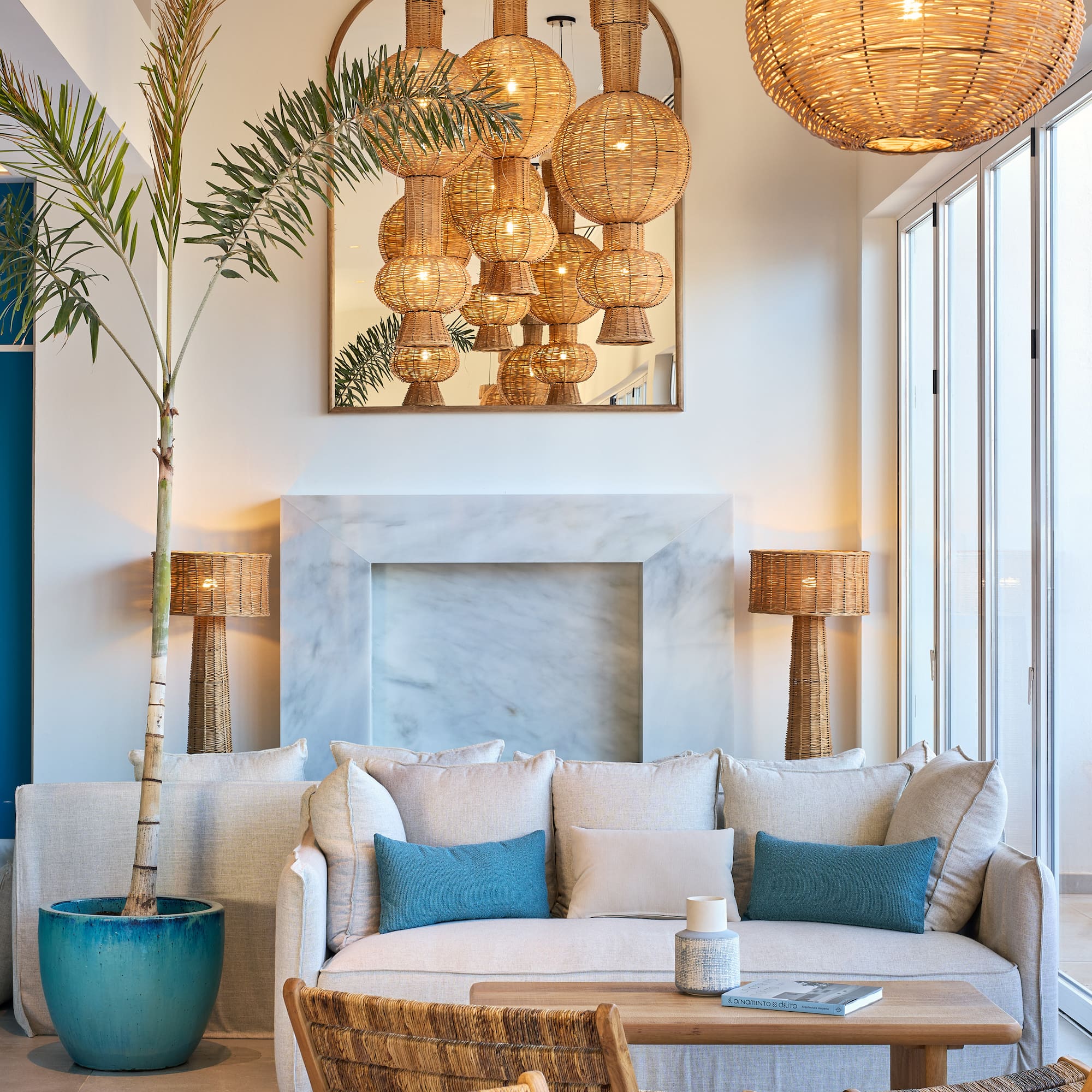 a room with a couch and a fireplace