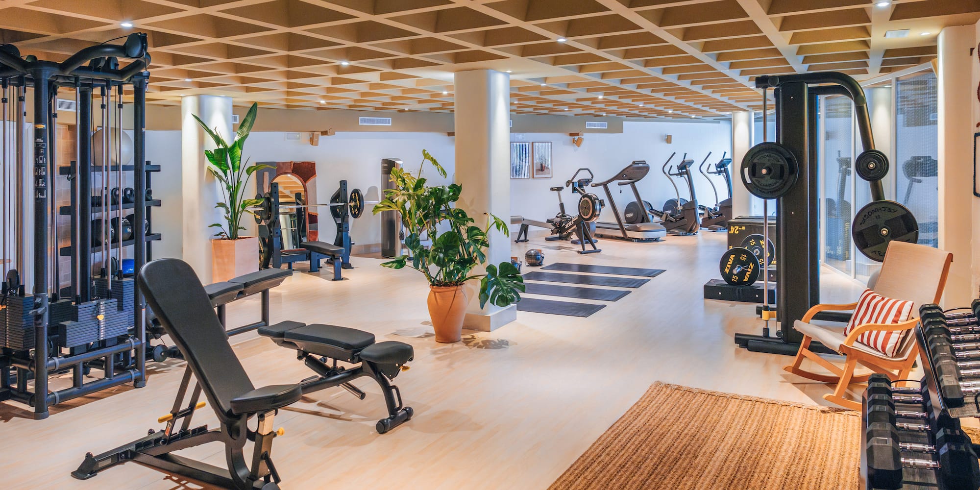 a large room with exercise equipment