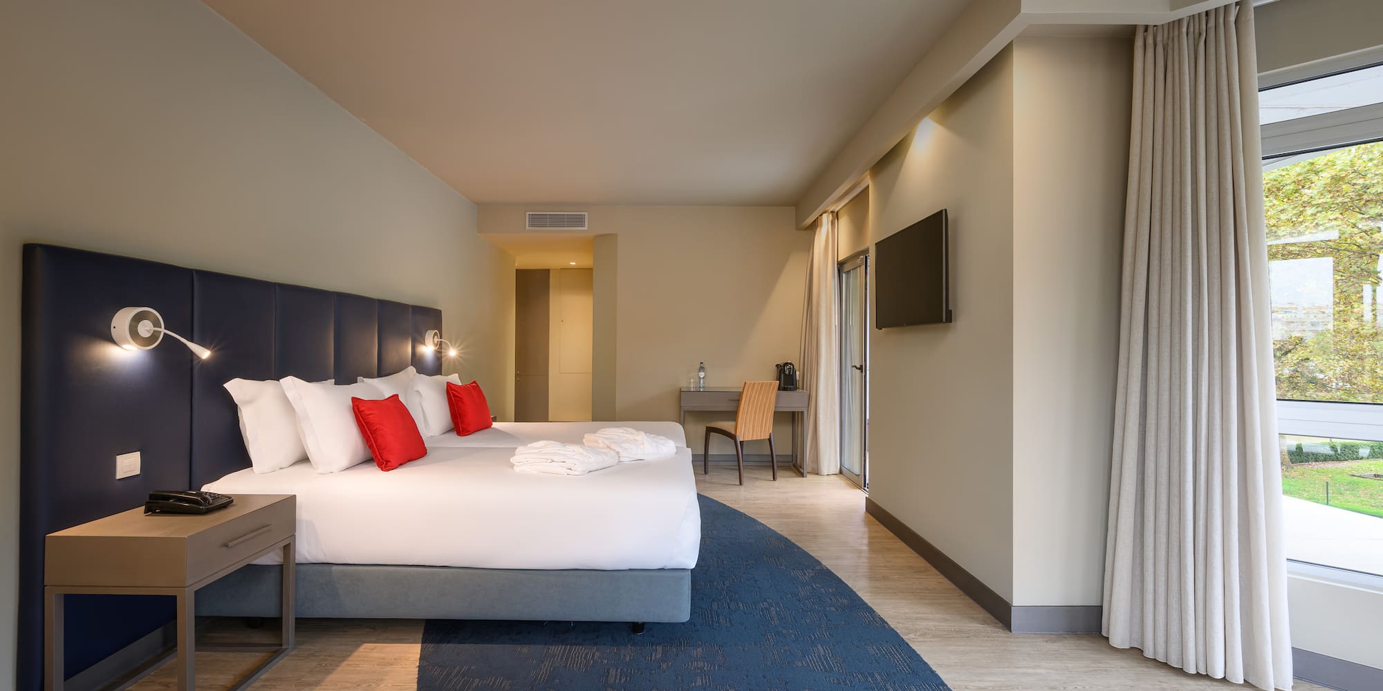 a room with a bed and a table