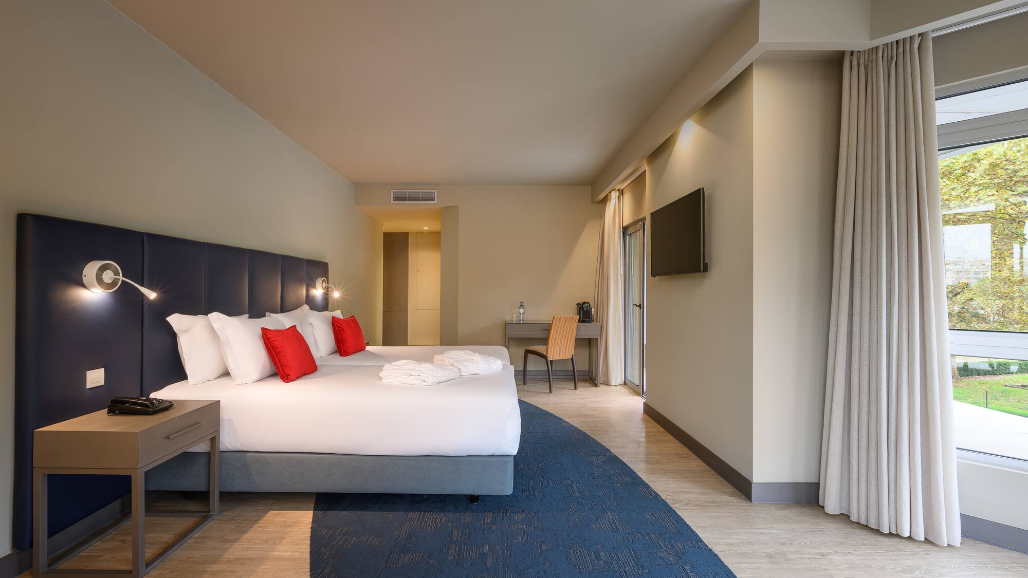 a room with a bed and a table