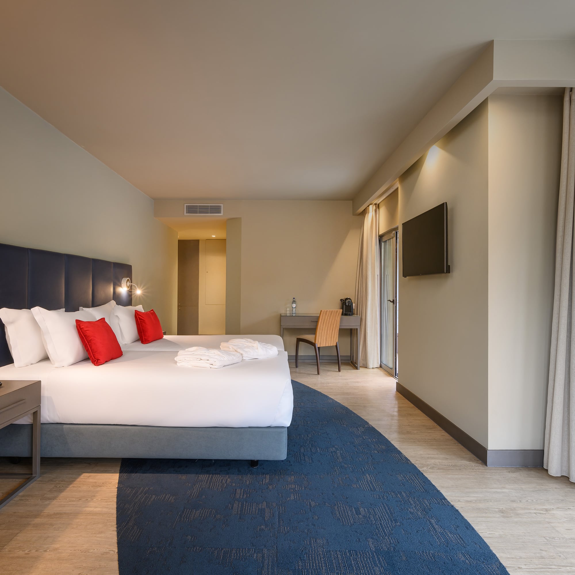 a room with a bed and a table