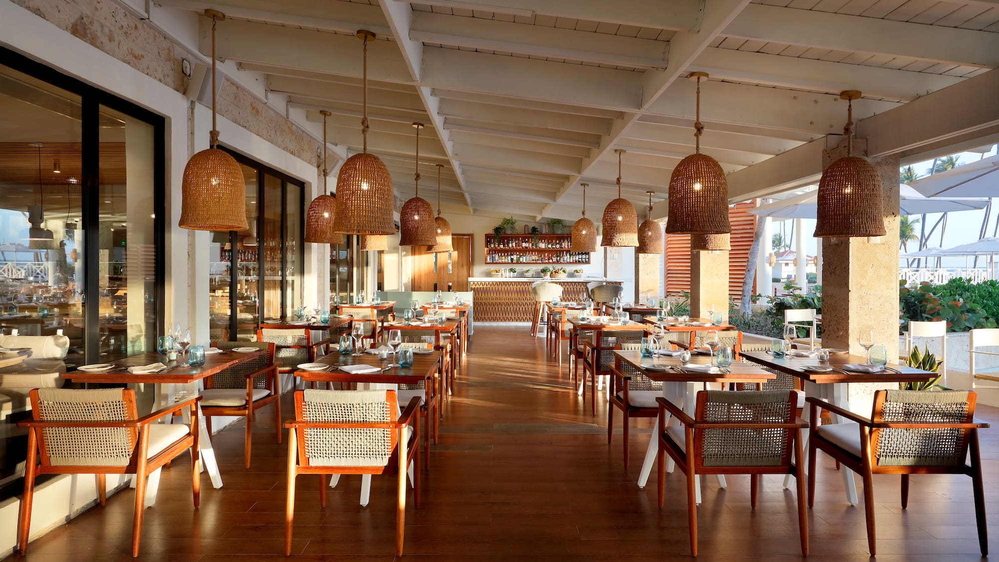 a restaurant with tables and chairs