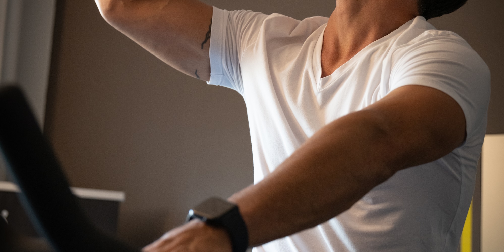 a man drinking from a bottle