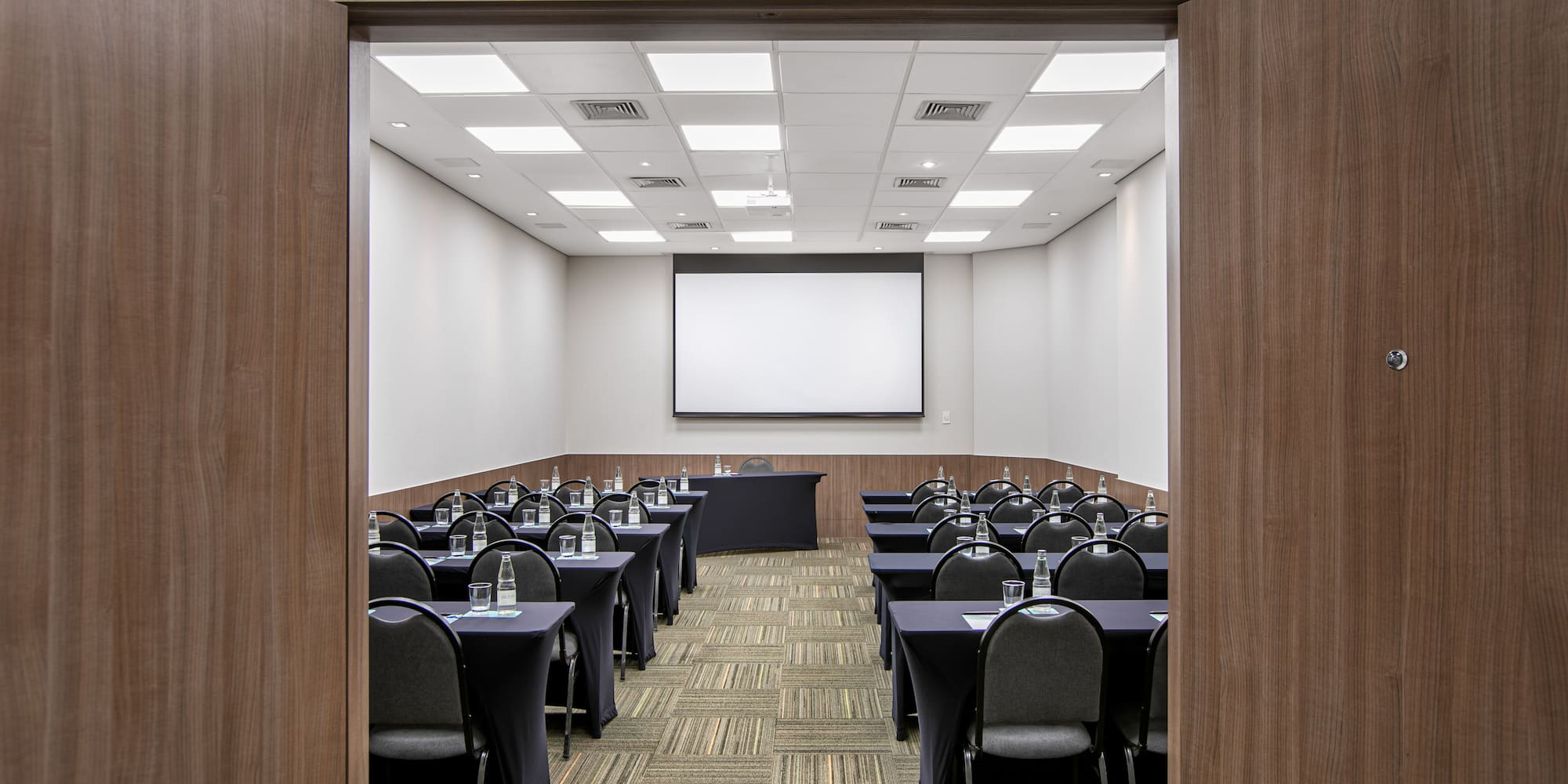 a room with tables and chairs