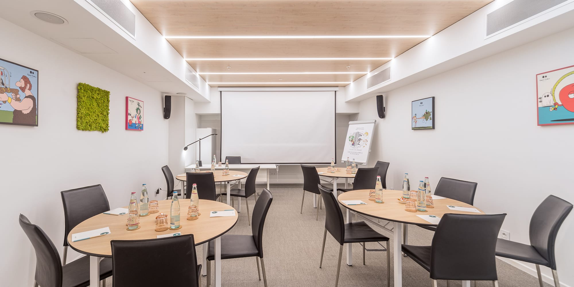 a room with tables and chairs