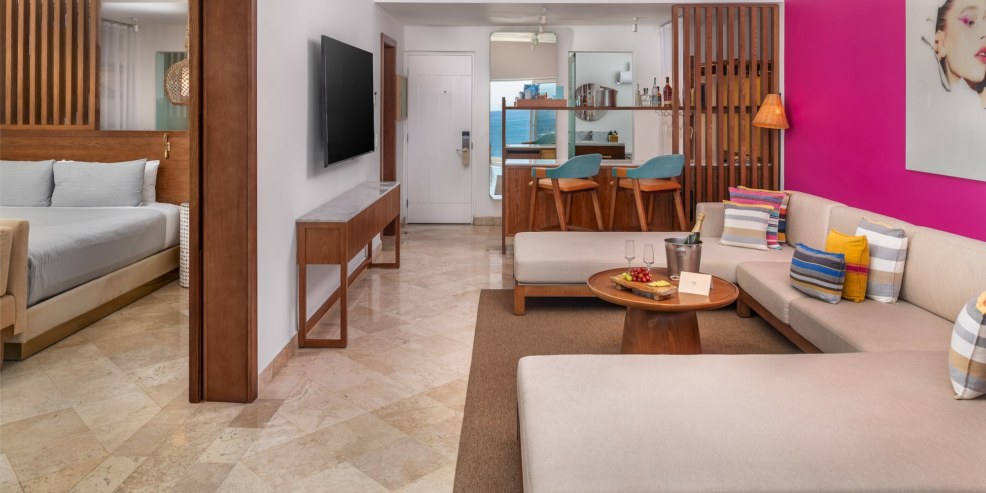 a living room with a television and couches