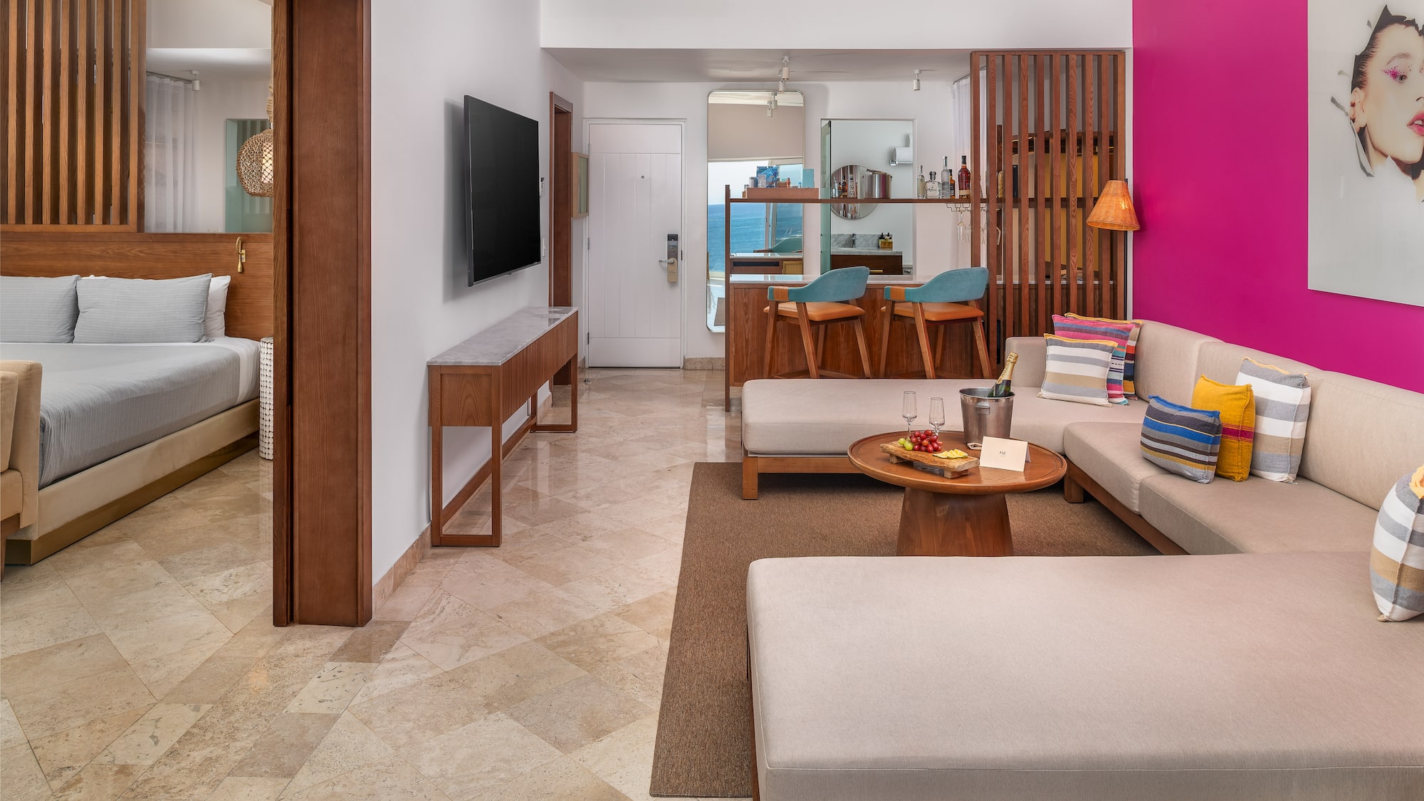 a living room with a television and couches