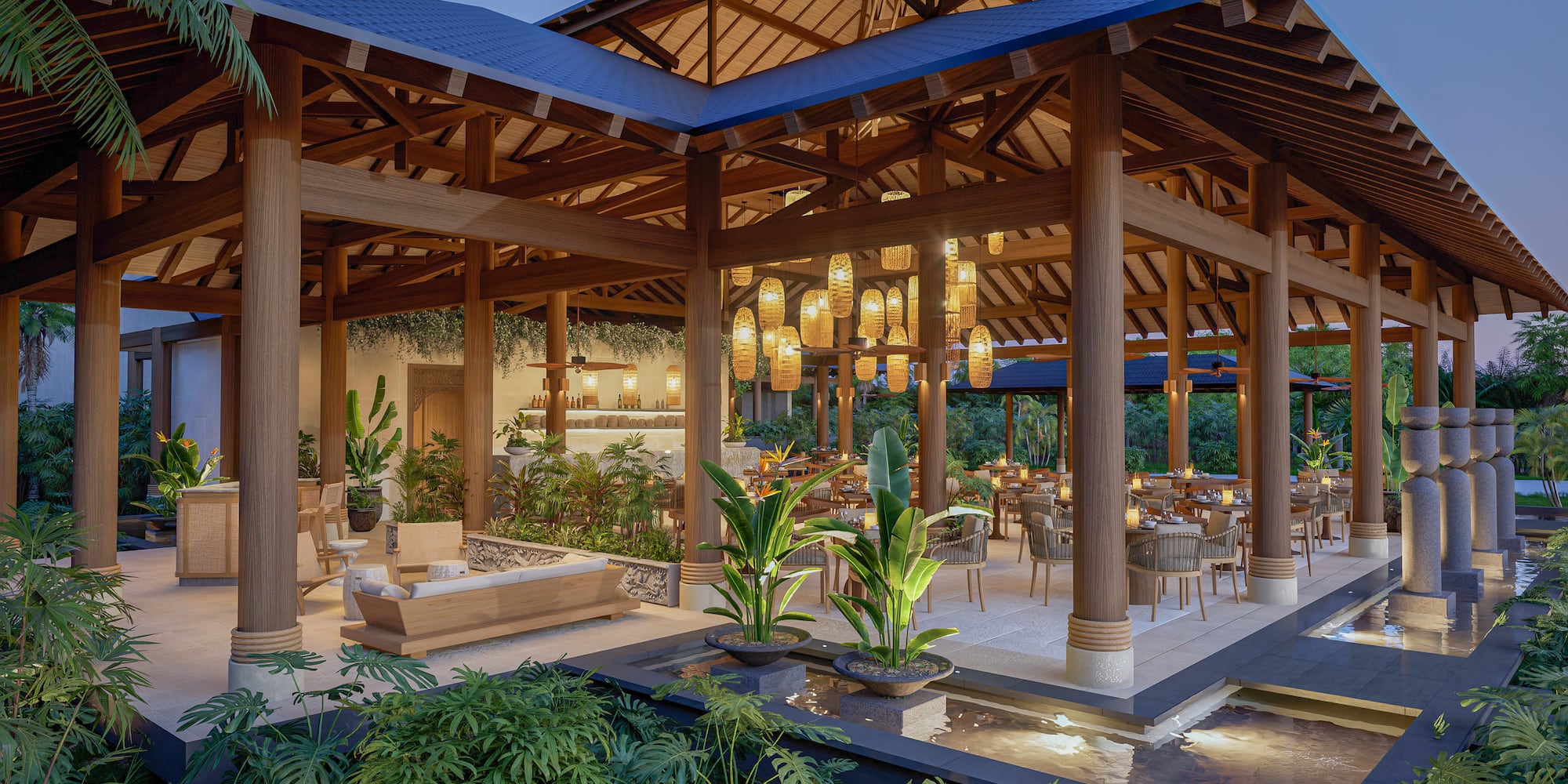 a building with a pool and tables