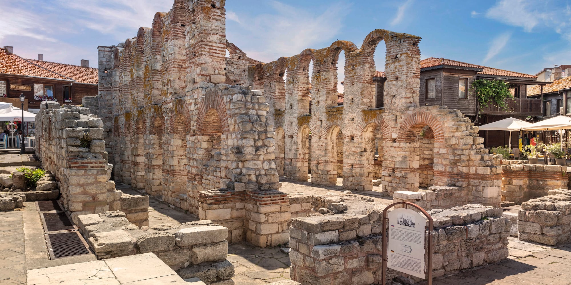 a stone building with arches