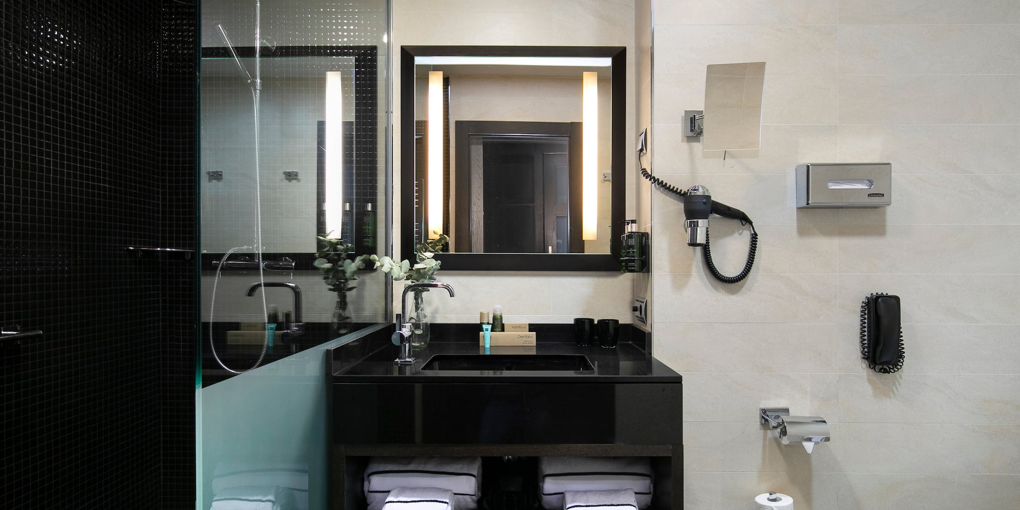 a bathroom with a mirror and sink