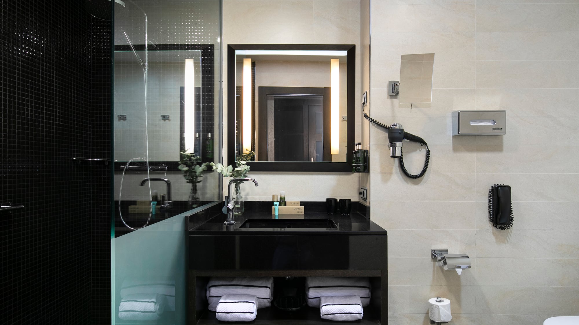 a bathroom with a mirror and sink